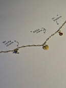 Gold Necklace with various charms, handmade 