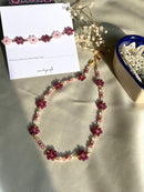 Complete set of necklace and bracelet made with flower shape beads