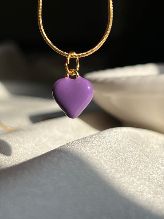 Purple heart-shaped pendant on a gold chain, handmade