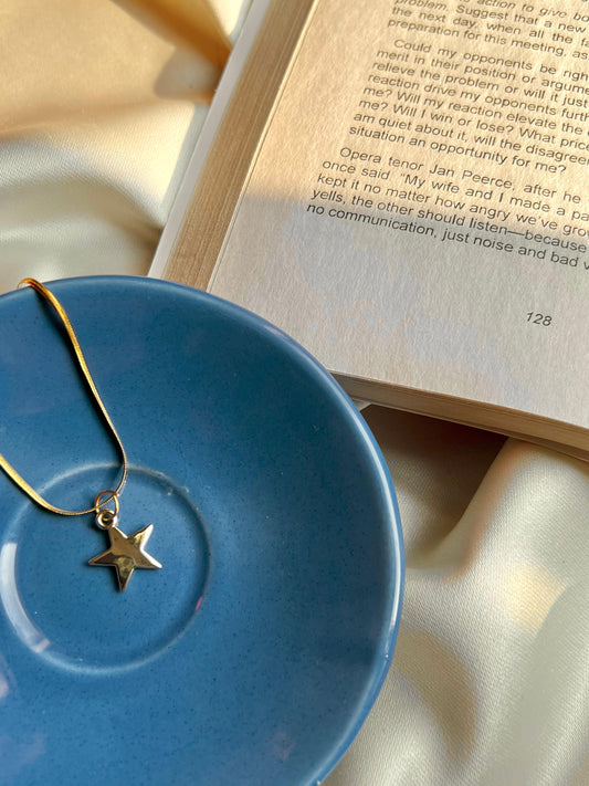 Star-shaped pendant, golden, handmade