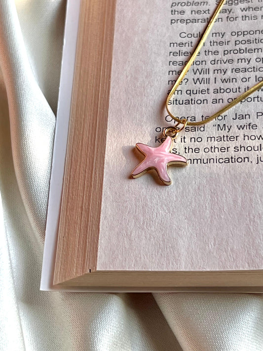 Starfish-shaped pendant on a gold chain, handmade