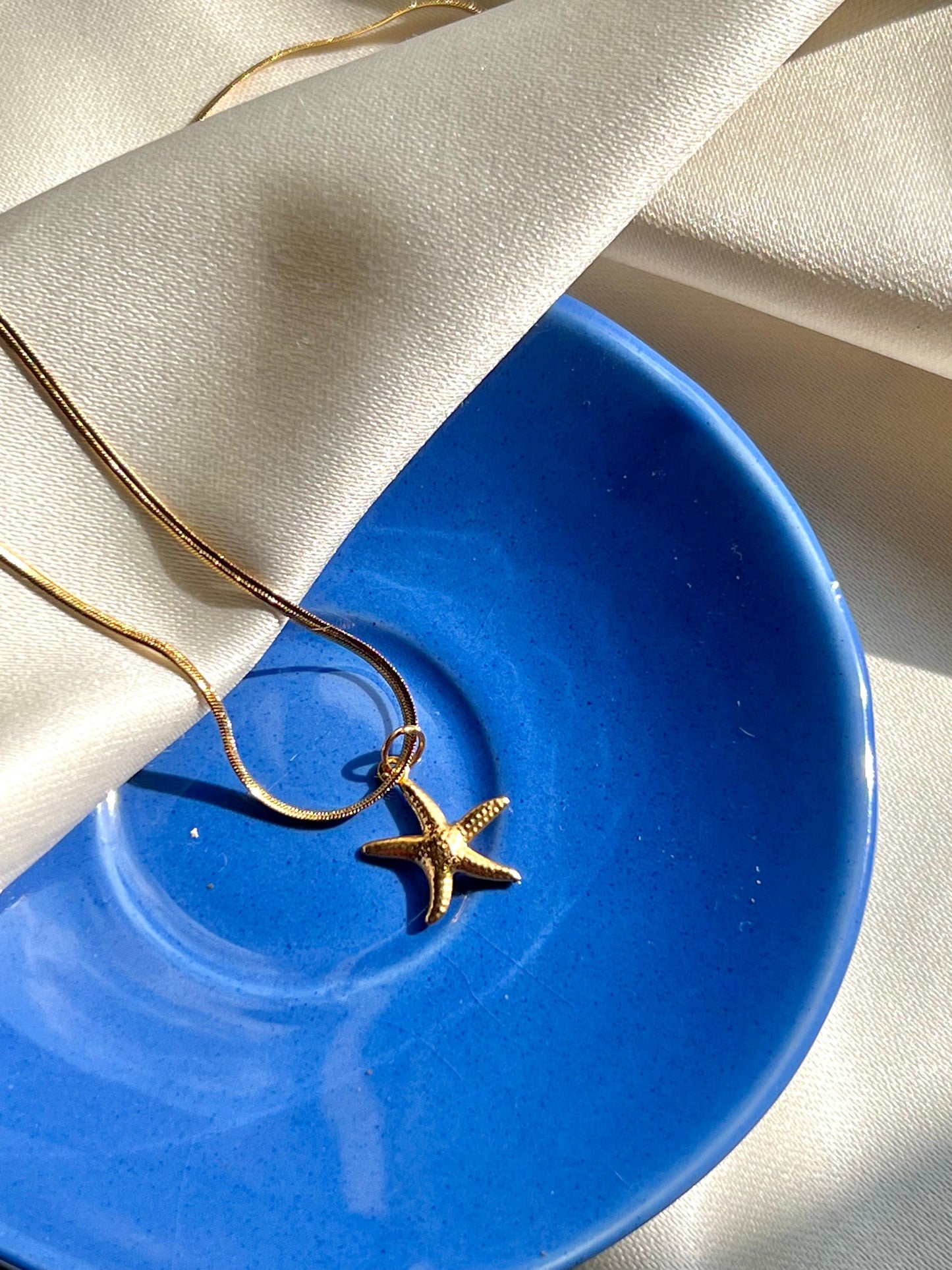 Star fish golden pendant