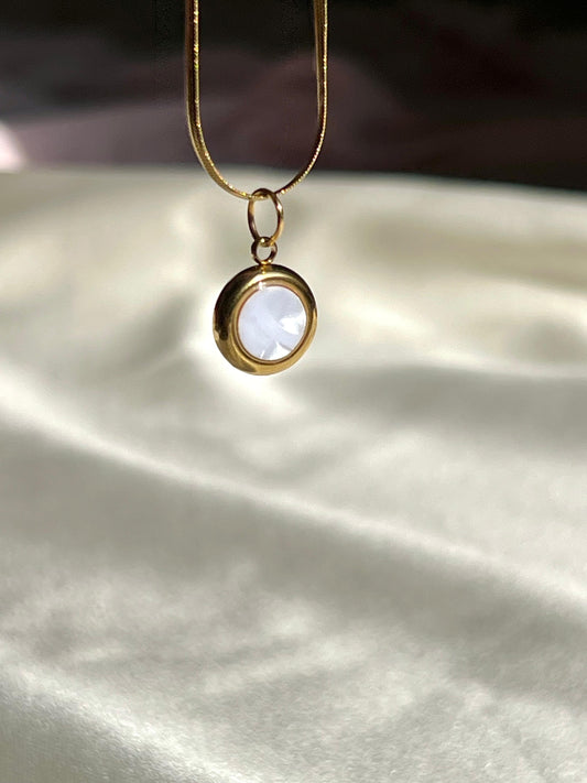 Gold necklace with a round pendant, elegant, handmade